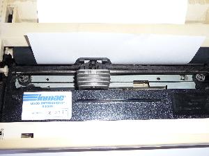 Detalle de la cabeza de impresión con su cinta entintada Detalle de la cabeza de impresión con su cinta entintada